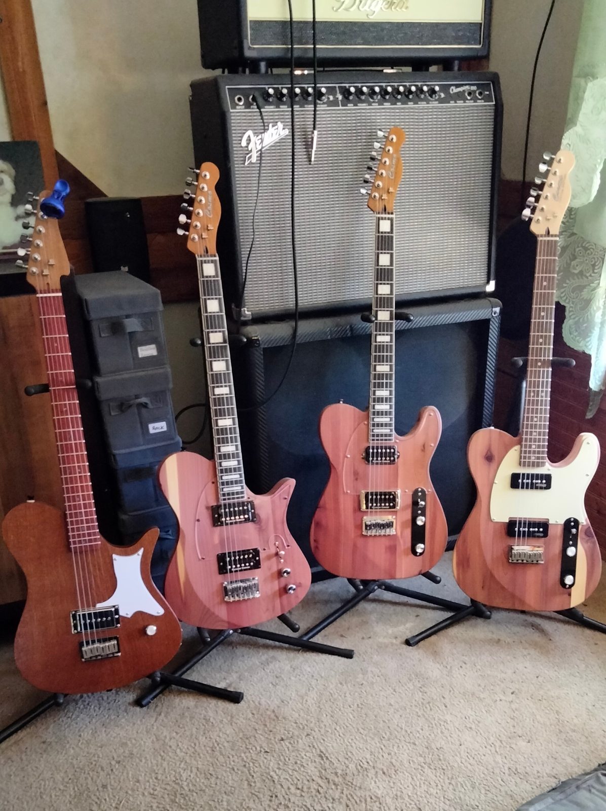 Family of cedar custom guitar builds